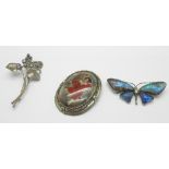 Three silver brooches including butterfly wing and Art Nouveau style