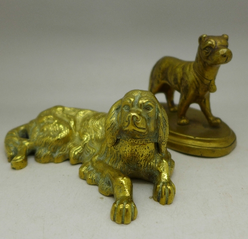 A brass inkwell in the form of a dog and one other brass dog on base