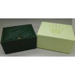 A Rolex watch box with Submariner booklet and outer box