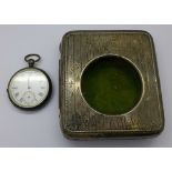 A silver fronted Goliath pocket watch travel stand,