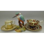 A Royal Crown Derby figure of a kingfisher and two Royal Crown Derby cups and saucers,