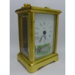 A brass carriage clock, the movement marked Rapport, London,