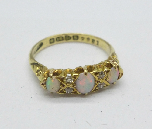 An 18ct gold, opal and diamond ring, Chester 1905, 3.