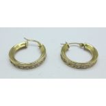 A pair of 9ct gold earrings, 3.
