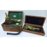 Two cased medical instruments, one marked I & S Maw, No. 11, Aldersgate St.
