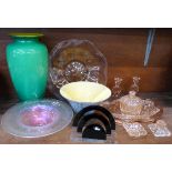 A collection of glassware including a peach dressing table set