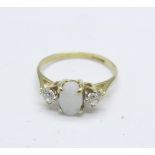 A 9ct gold, opal and clear stone ring, 1.