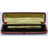 A 9ct gold Watermans pen with 14ct nib, boxed, total weight 27.