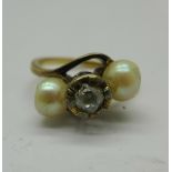 A 9ct gold, diamond and pearl ring, 3.4g, L, approximately 0.