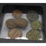 Seven Roman coins,