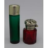 Two coloured glass and silver topped perfume bottles, ruby glass hallmarked Birmingham 1896,
