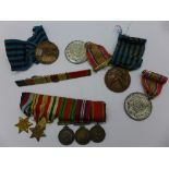 Six miniature medals,