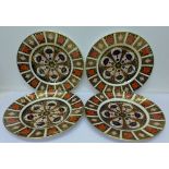 A set of four Royal Crown Derby 1128 pattern plates,