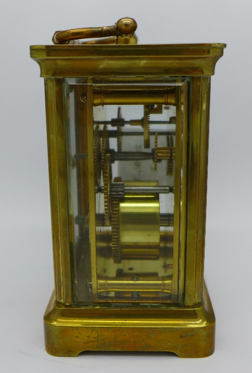 A brass carriage clock, the top bears inscription, From "The Queen's" Regt. - Image 2 of 4