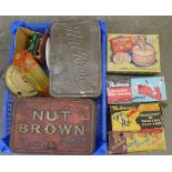 A collection of Nut Brown advertising items including an ashtray, two tobacco tins,