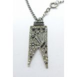 A French silver Art Deco pendant on a 935 silver chain,