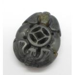 A carved pendant