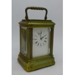 A small brass carriage clock,