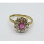 A 9ct gold, ruby and diamond cluster ring, 2.