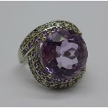 A large silver and amethyst ring,