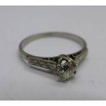 A platinum and diamond solitaire ring, 1.