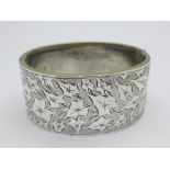 A white metal bangle,