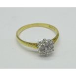 An 18ct gold and diamond cluster ring, 2.