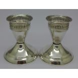 A Duchin Creation weighted pair of sterling candlesticks, gross weight 262.