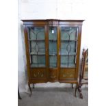 An Edward VII inlaid mahogany display cabinet