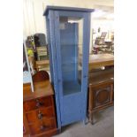 A painted pine single door display cabinet