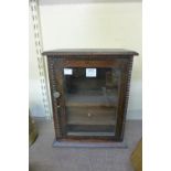 An oak smokers cabinet