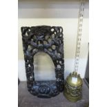A Chinese bronze bell on carved hardwood frame