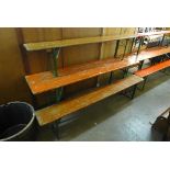 A German folding trestle table and a pair of benches