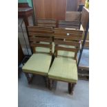 Four oak and upholstered dining chairs