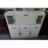 A 1960's painted kitchen cabinet