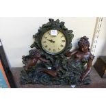 A Baroque style mantel timepiece