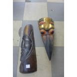 An African carved wooden mask and a Chinese carved wooden mask