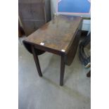 A George III mahogany drop-leaf dining table