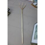 A wooden pitchfork