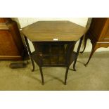 An Arts and Crafts mahogany display table