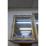 A gilt framed mirror