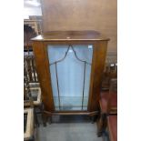 A walnut china cabinet