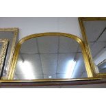 A gilt framed overmantel mirror