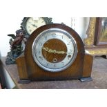 An Enfield oak mantel clock