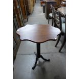 A mahogany wine table