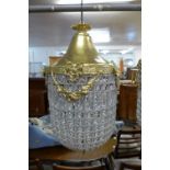 A gilt metal and crystal glass chandelier