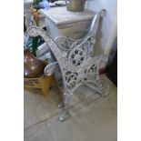 A pair of cast iron bench ends