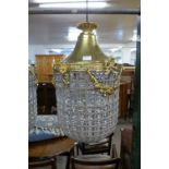 A gilt metal and crystal glass chandelier