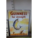 A reproduction tin Guinness sign