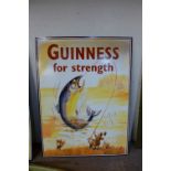 A reproduction tin Guinness sign